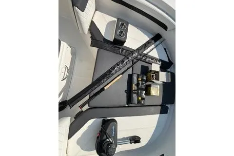 Slide: The Image of 2023 Bayliner 1703 Trophy boat interior with fishing gear and accessories. - 16