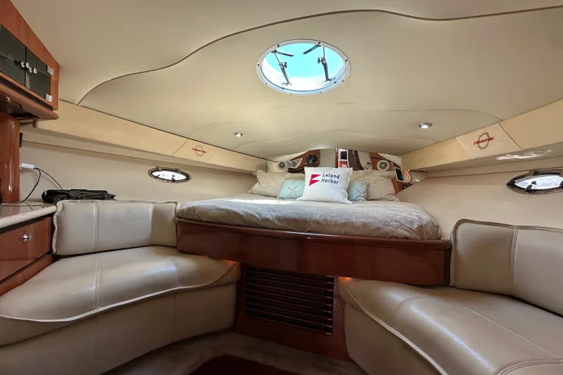 Slide: The Image of Luxurious interior of 2005 Fountain 48 Express Cruiser with cozy bed and elegant seating. - 28