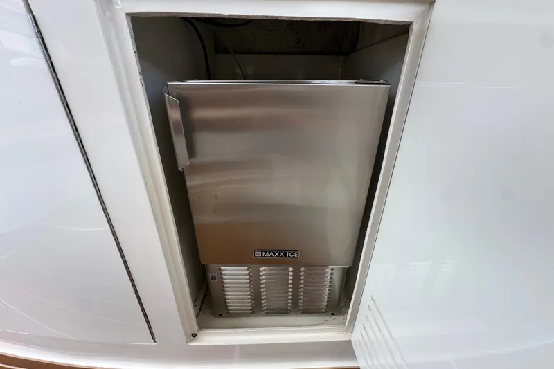 Slide: The Image of Built-in Maxx Ice machine on a 2005 Fountain 48 Express Cruiser yacht. - 14