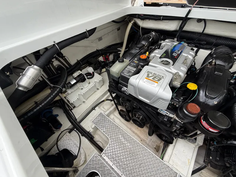 Slide: The Image of The engine compartment of a 2014 Formula 350 Crossover Bowrider featuring a powerful V8 engine. - 42