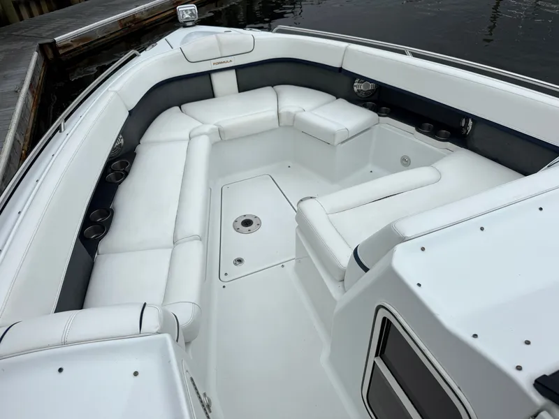 Slide: The Image of The 2014 Formula 350 Crossover Bowrider features a spacious, cushioned seating area in the bow. - 30