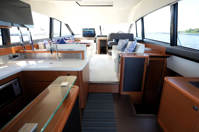 Slide: The Image of Luxurious interior of a 2013 Prestige 500 yacht with modern kitchen and seating area. - 45