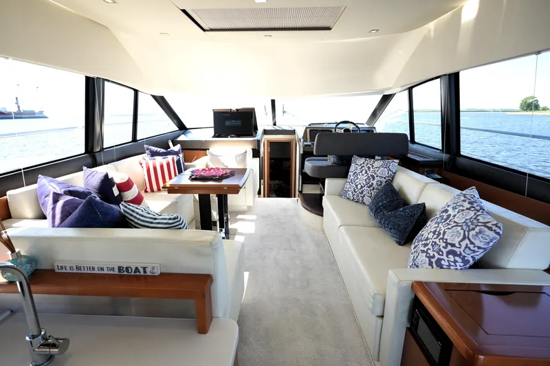 Slide: The Image of Luxurious interior of a 2013 Prestige 500 yacht with elegant seating and nautical decor. - 1