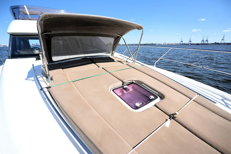 Slide: The Image of 2013 Prestige 500 yacht deck with sunbed and ocean view. - 38