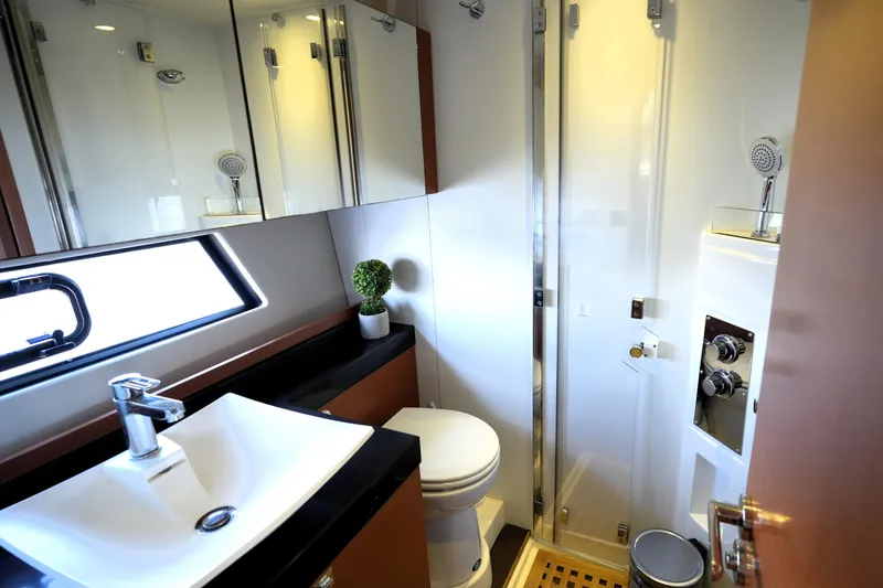 Slide: The Image of Luxurious bathroom in 2013 Prestige 500 yacht with modern fixtures and elegant design. - 71