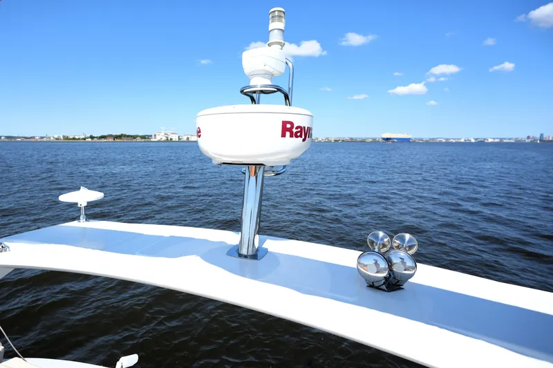 Slide: The Image of Radar equipment on a 2013 Prestige 500 yacht, overlooking a calm blue sea. - 40
