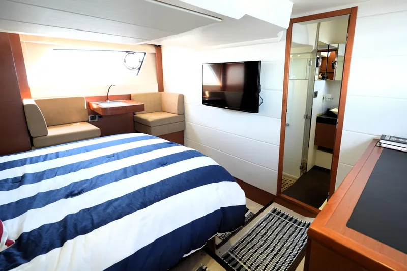 Slide: The Image of Luxurious cabin interior of a 2013 Prestige 500 yacht with modern amenities. - 77