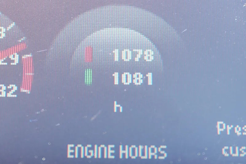 Slide: The Image of Dashboard display showing engine hours for a 2013 Prestige 500. - 66