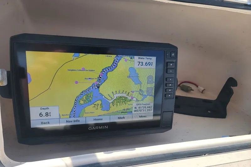Slide: The Image of Garmin GPS display on 2008 Grady-White Tournament 225 boat, showing map and water temperature. - 4
