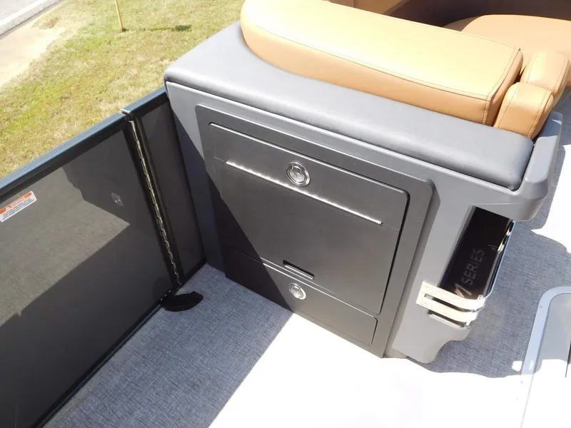 Slide: The Image of A sleek storage unit with two drawers on a Bennington 23 MSB boat. - 17