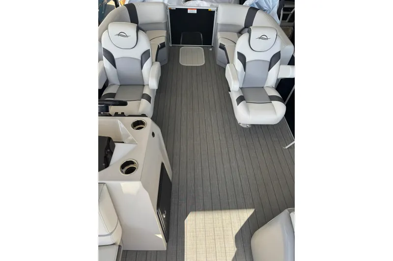 Slide: The Image of Interior of 2025 SunCatcher Select 20RC boat with modern seating and flooring. - 2
