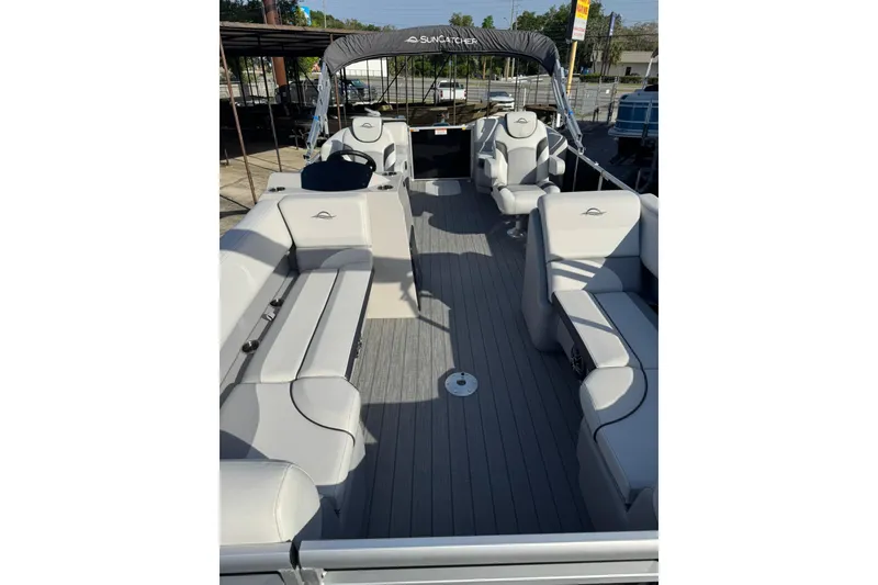 Slide: The Image of 2025 SunCatcher Select 20RC pontoon boat with spacious seating and modern design. - 9