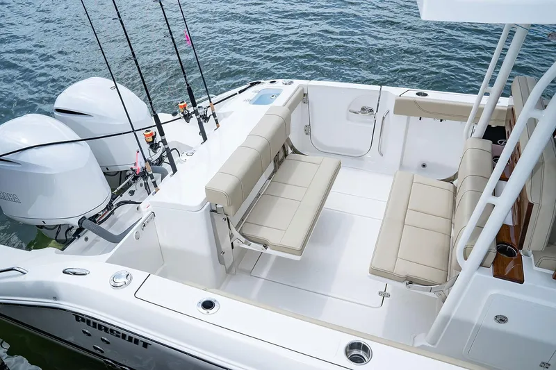 Slide: The Image of Manufacturer Provided Image: 2025 Pursuit S 288 Sport boat with dual engines and spacious seating. - 16