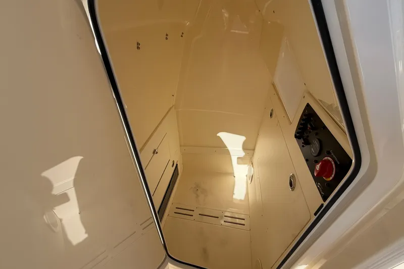 Slide: The Image of Interior view of 2027 Scout 220 XSF boat cabin with control panel. - 30