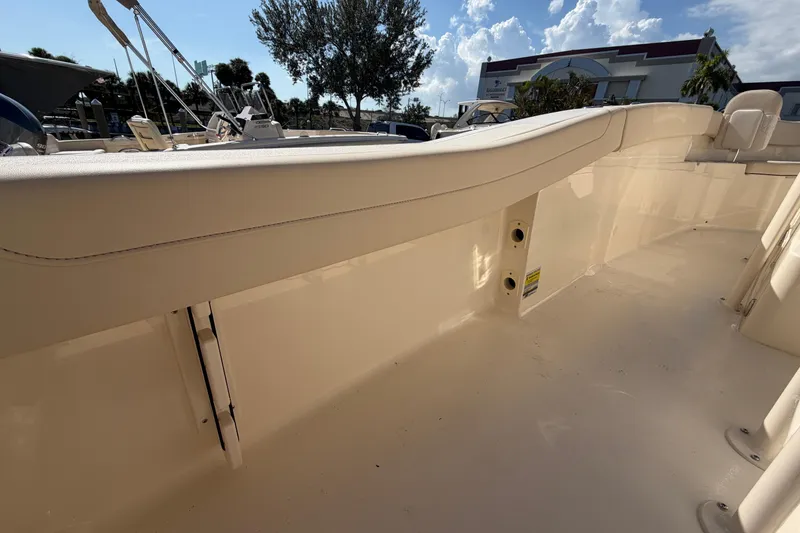 Slide: The Image of 2027 Scout 220 XSF boat interior, showcasing sleek design and spacious seating. - 10