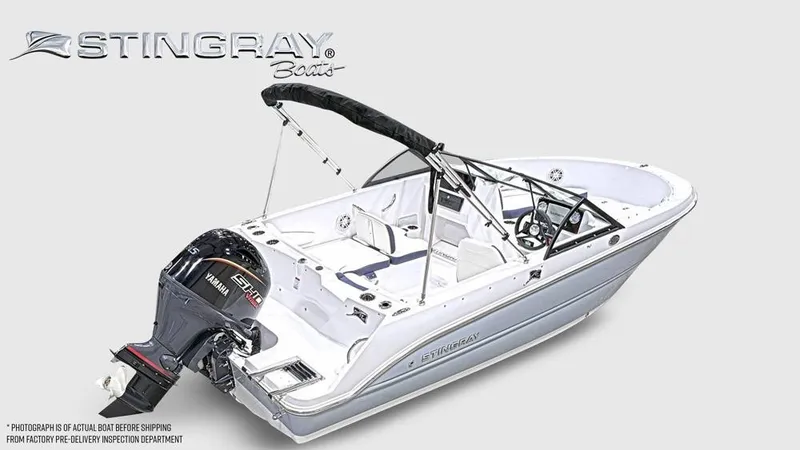 Slide: The Image of A modern Stingray 172 DC motorboat with an outboard engine and sleek design. - 2