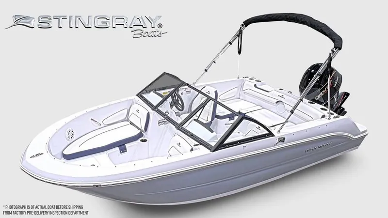 Slide: The Image of The image shows a modern Stingray 172 DC boat with an open deck and black Bimini top. - 5