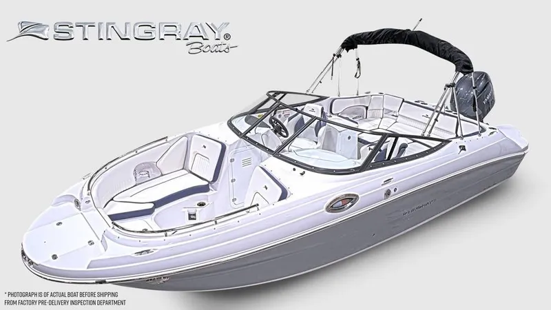 Slide: The Image of The image shows a 2027 Stingray 231 DC boat with a sleek white and gray design. - 5