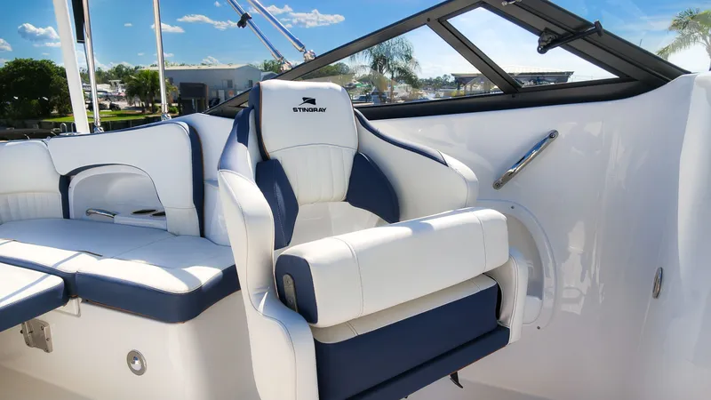 Slide: The Image of A modern boat seat with blue and white upholstery, offering a clear view of the sky. - 16