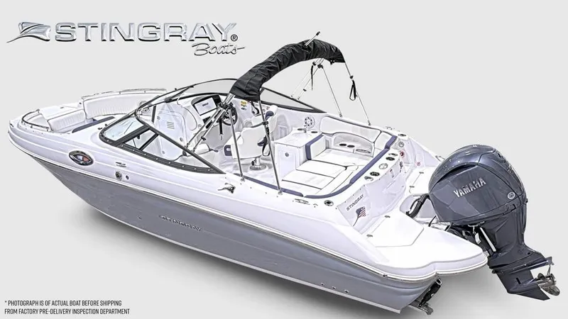 Slide: The Image of The image shows a modern Stingray 231 DC boat with a Yamaha outboard motor. - 4