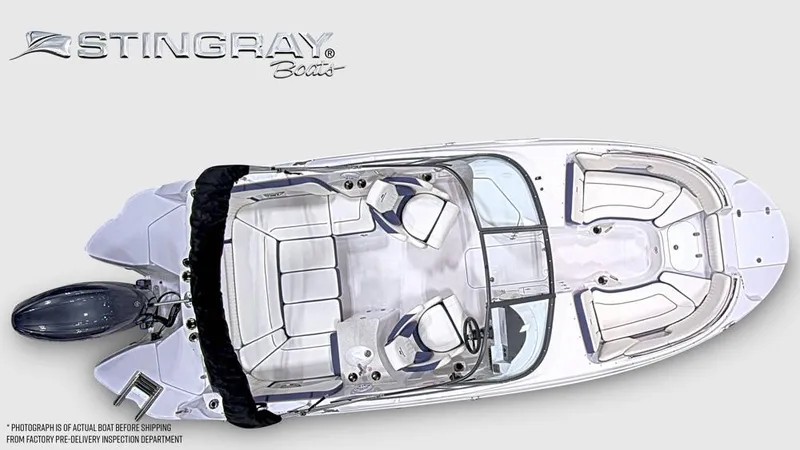 Slide: The Image of Aerial view of a Stingray 231 DC boat with spacious deck and seating areas. - 7