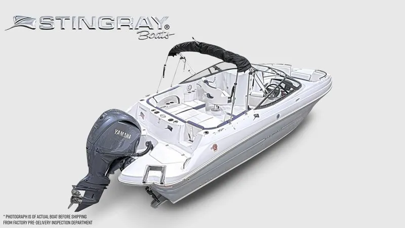 Slide: The Image of The image shows a 2027 Stingray 231 DC boat with a Yamaha outboard motor. - 2