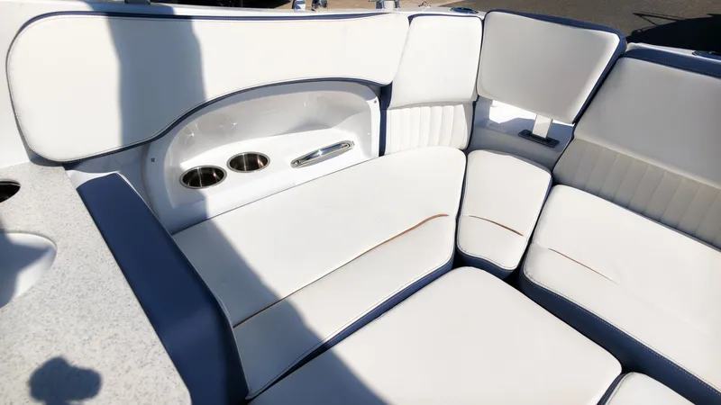 Slide: The Image of Interior of the 2027 Stingray 231 DC with white upholstery and cup holders. - 13