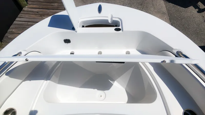 Slide: The Image of Stingray 173 CC 2027: Open storage compartment in the bow area with stainless steel handles and clean design. - 12