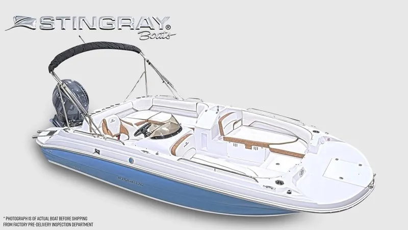Slide: The Image of The image shows a 2027 Stingray 192 SC boat with a blue hull and white deck. - 2