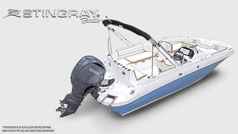 Slide: The Image of A modern Stingray 192 SC boat with Yamaha outboard motor, white-blue hull, and comfortable interior. - 4