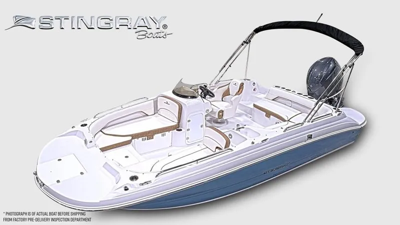 Slide: The Image of The image shows a modern Stingray 192 SC boat with a blue hull and white deck. - 6