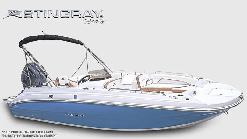 Slide: The Image of The image shows a 2027 Stingray 192 SC boat with a blue hull and white deck. - 9