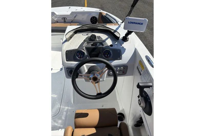 Slide: The Image of Steering console of 2026 Tahoe 1950 boat with Lowrance navigation system. - 9