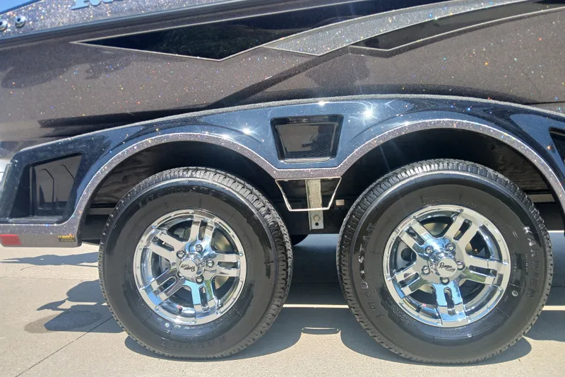 Slide: The Image of 2026 Ranger 1880MS boat trailer with shiny chrome wheels and glittery finish. - 7