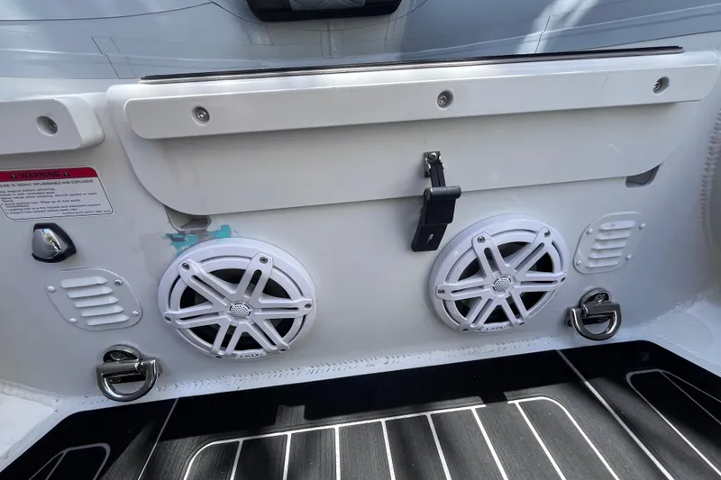 Slide: The Image of 2024 Highfield Sport 520 boat speakers and deck detail, showcasing modern marine audio system. - 15