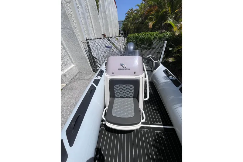 Slide: The Image of 2024 Highfield Sport 520 boat with sleek seating and modern design. - 19