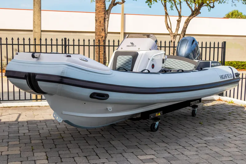 The Image of 2024 Highfield Sport 520 boat on display, featuring sleek design and modern features. - 0