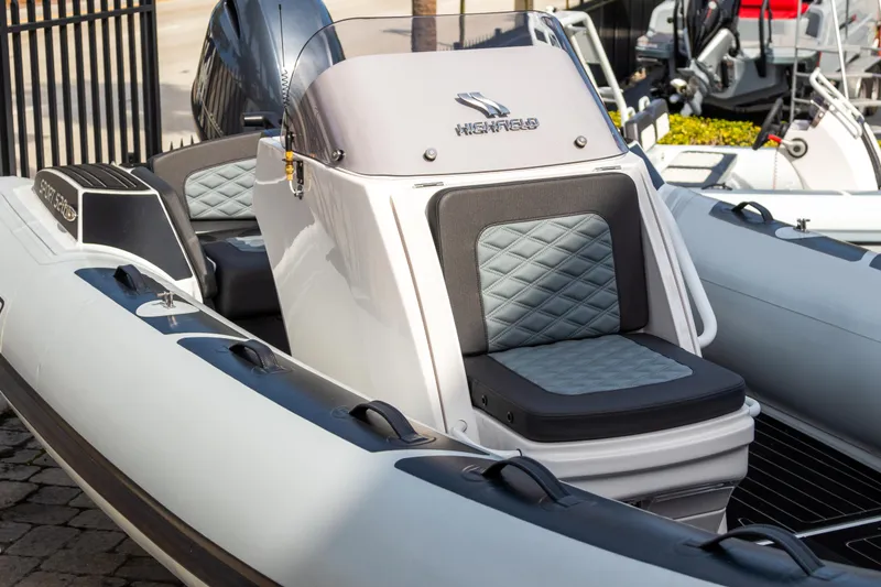 Slide: The Image of 2024 Highfield Sport 520 boat with sleek design and comfortable seating. - 18