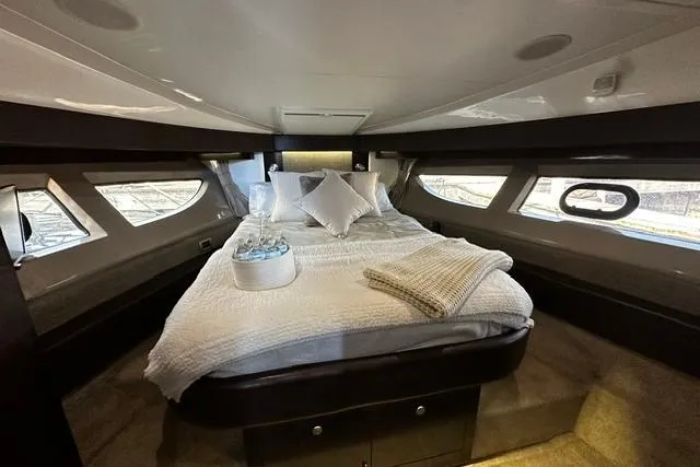 Slide: The Image of Luxurious cabin interior of 2017 Sea Ray Sundancer 400 yacht with elegant bedding. - 23