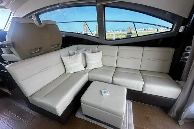 Slide: The Image of Luxurious interior of 2017 Sea Ray Sundancer 400 yacht with cream leather seating and scenic windows. - 15