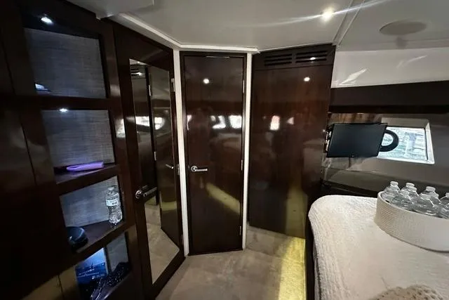 Slide: The Image of Luxurious interior of 2017 Sea Ray Sundancer 400 yacht cabin with modern amenities. - 25
