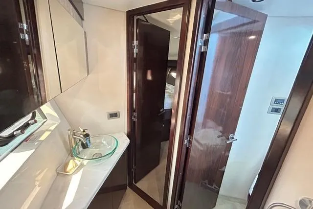 Slide: The Image of Luxurious bathroom interior of 2017 Sea Ray Sundancer 400 yacht with modern fixtures. - 35