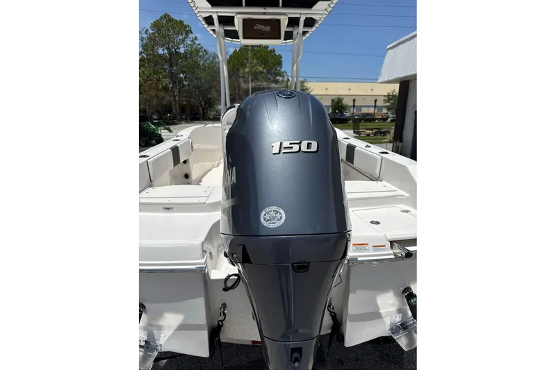 Slide: The Image of 2021 Robalo R180 Center Console boat with Yamaha 150 outboard motor. - 12