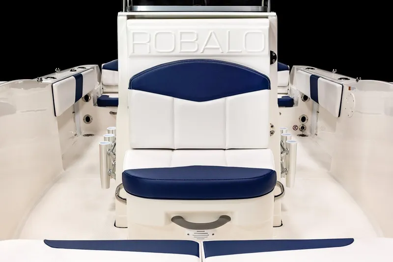 Slide: The Image of Manufacturer Provided Image: 2021 Robalo R180 Center Console boat interior with white and blue seating. - 22