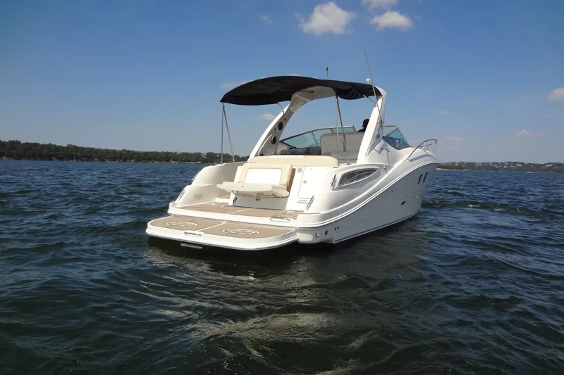 Slide: The Image of 2013 Sea Ray Sundancer 330 yacht cruising on a sunny lake. - 3