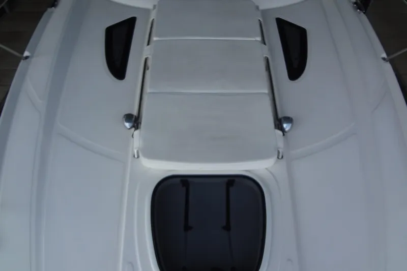 Slide: The Image of 2013 Sea Ray Sundancer 330 boat deck with sunpad and hatch. - 36