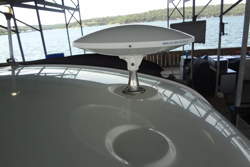 Slide: The Image of Antenna on 2013 Sea Ray Sundancer 330 boat docked by a scenic lake. - 37