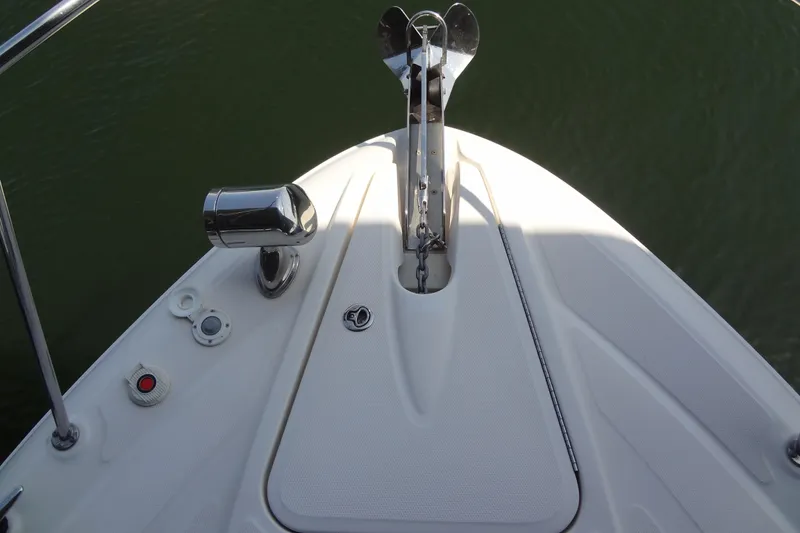Slide: The Image of Bow of 2013 Sea Ray Sundancer 330 with anchor and deck fittings. - 34