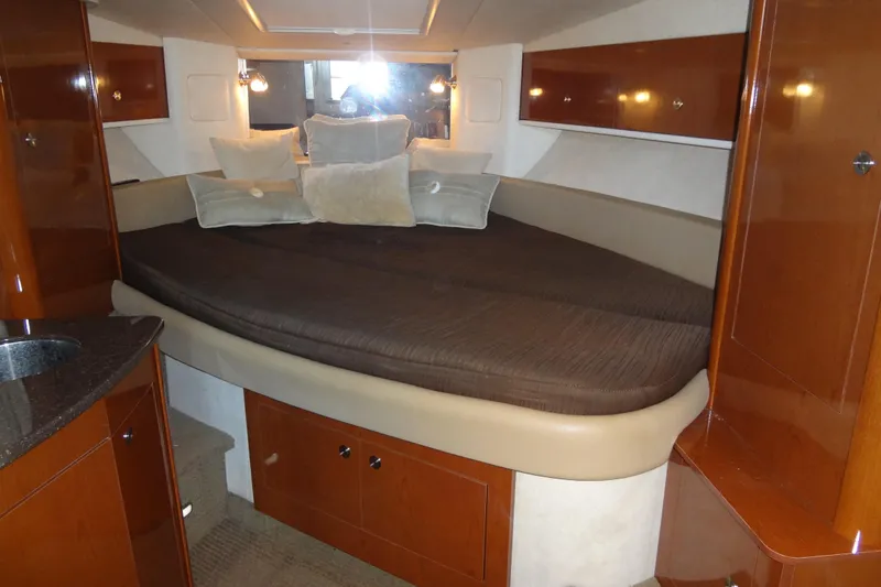 Slide: The Image of Luxurious cabin interior of 2013 Sea Ray Sundancer 330 yacht with cozy bedding. - 40