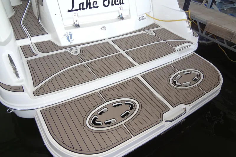 Slide: The Image of 2013 Sea Ray Sundancer 330 swim platform with custom teak-style decking. - 14